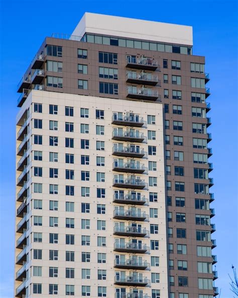 Premium Photo Blue Sky With Tall Building