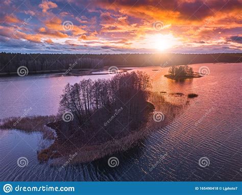 Lake With Islands And A Purple Sunset Aerial Panorama Stock Photo