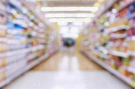 Supermarket aisle blur abstract background 12801884 Stock Photo at Vecteezy