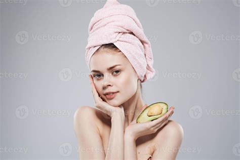 Pretty Woman Naked Shoulders With Towel On Head Avocado In Hand Cropped