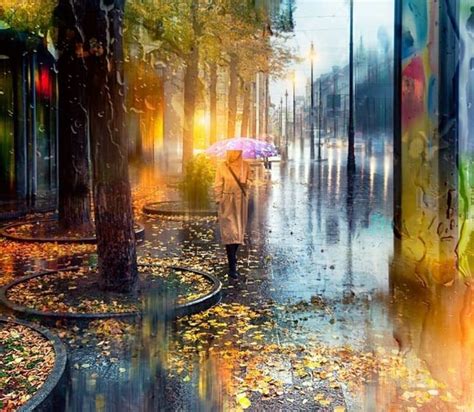 a person with an umbrella is walking down the street