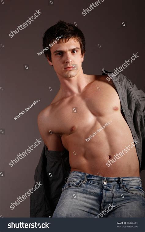 Studio Portrait Handsome Man Showing His Stock Photo 46026613