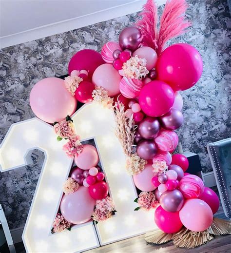 21st Birthday Party Decorations with Balloons and Flowers