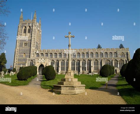 The War Memorial Cross In Front Of All Saint S Church In Long Melford Suffolk England Stock