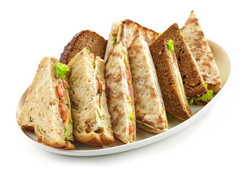 Various Triangle Sandwiches on Wooden Board Stock Image - Image of ...