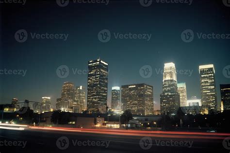 a city skyline at night with lights on the buildings 44004775 Stock ...