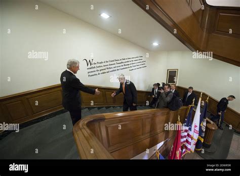 Secretary Of Defense Chuck Hagel Greets Secretary Of State John Kerry