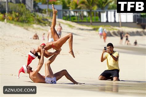 Izabel Goulart Sexy Gets Into The Christmas Spirit Wearing A Tiny Red Bikini At The Beach In St