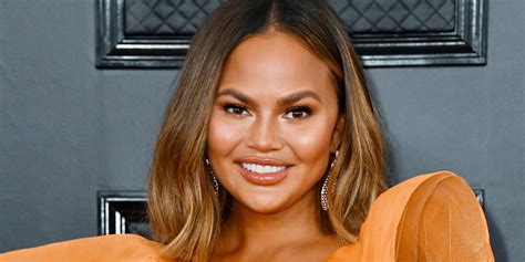 Chrissy Teigen Posts A Topless Selfie Showing Off Surgery Scars