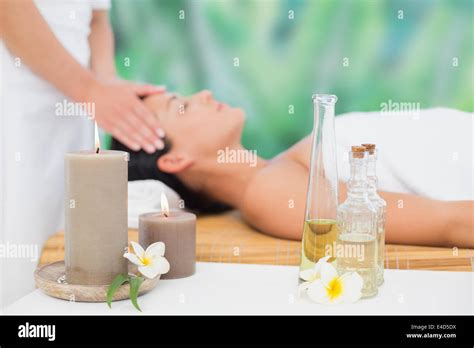 Beautiful Brunette Enjoying A Head Massage Stock Photo Alamy