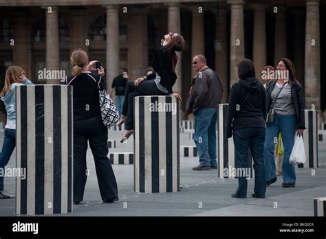 Palais Royale Gardens Jardins Teenagers Playing In Park Colonnes De