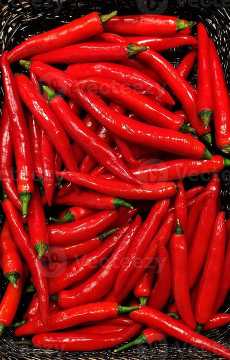 Fresh Red Hot Chillies Pile Background Top View Stock Photo At Vecteezy