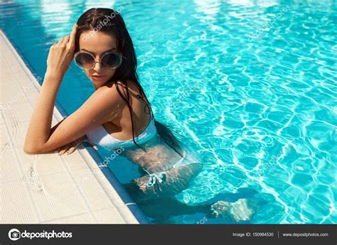 Woman In Pool Beautiful Girl In Sexy Bikini Swimwear In Water Stock