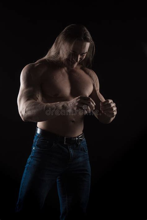 Naked Torso Male Bodybuilder Athlete With Long Blond Hair In Studio