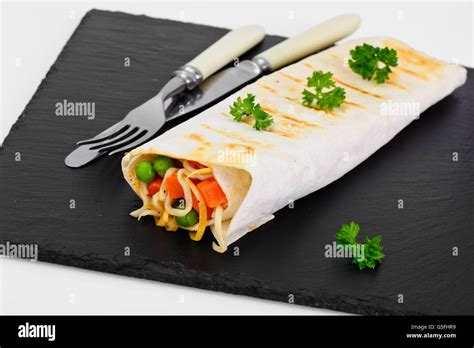 Pita Bread With Vegetables Chinese Noodles And Arugula Stock Photo Alamy