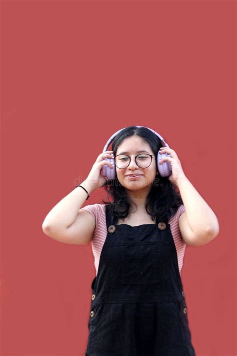 Year Old Latina Woman Points To Something That She Likes Surprises And Excites Such As