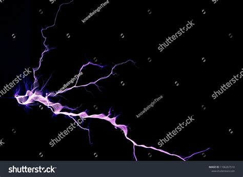 Tesla Coil Electrostatic Discharge Spark Lightning On Black