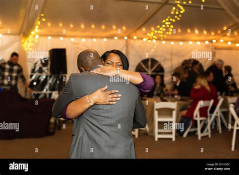 Groom dancing with mother at reception Stock Photo - Alamy