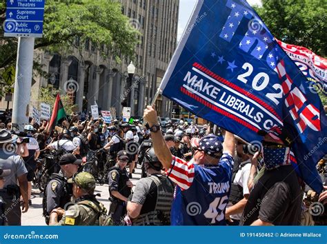 Conservative Demonstrator Hold Up Thin Blue Line Flags As Police ...