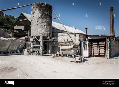 Cement factory. Equipment for the production of cement blocks in a small cement factory Stock ...