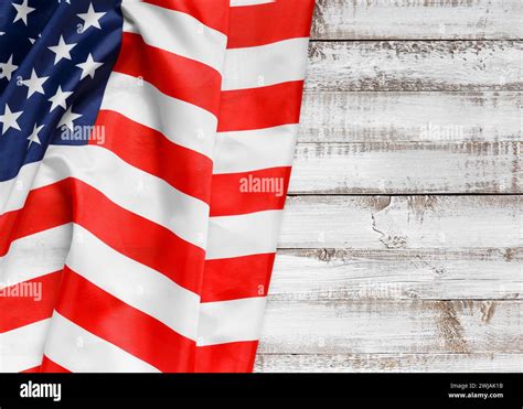 Stars And Stripes American Flag On Rustic Wooden Background Top View