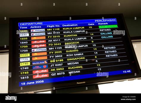 Flight Information screen KLIA Departures Board Stock Photo - Alamy