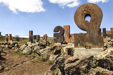 Monument Statue Alphabet Letters Made Of Stone Standing On Rocks On The