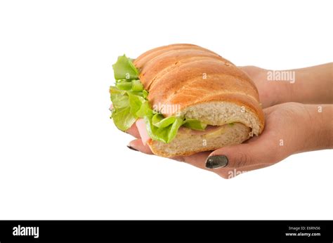 Closeup Of Hand Holding Lettuce And Ham Sandwich Stock Photo Alamy