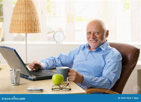 Portrait Of Happy Senior Man With Computer Stock Photo Image Of Desk