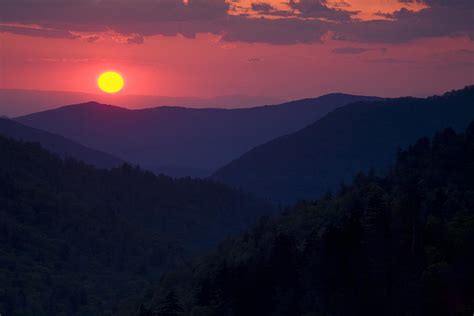 Setting Sun In The Mountains Photograph By Andrew Soundarajan