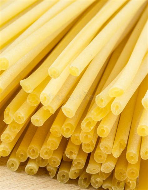 Uncooked Italian Spaghetti On A White Background Stock Photo Image