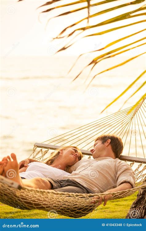 Couple Relaxing In Tropical Hammock Stock Photo Image Of Legs Relax