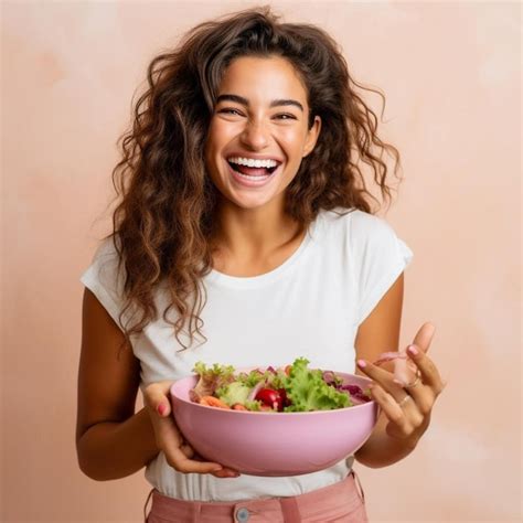 Premium AI Image A Woman Holding A Bowl Of Food And Smiling