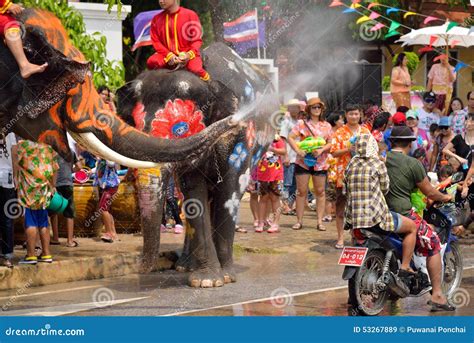 Songkran Festival People Enjoy With The Splashing Water With Elephants In Thailand Editorial