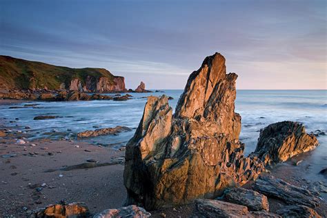 Jagged Rocks On The South Devon Coast by Adam Burton / Robertharding