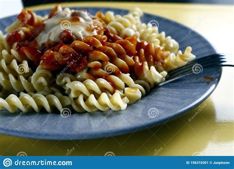 Freshly Cooked Spiral Pasta With Cheese And Tomato Sauce Stock Image