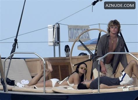 Michelle Rodriguez Shows Off Her Bikini Body With Model Jordan Barrett On A Yacht In Sardinia