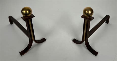 Pair Of Modernist Cast Iron Brass And Wrought Iron Andirons For Sale