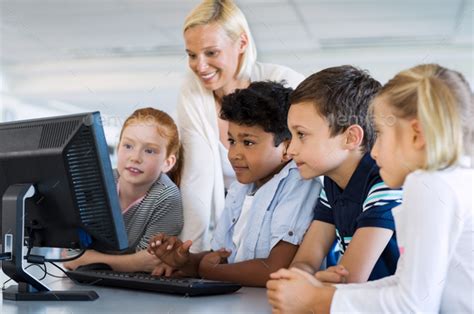 Kids In Computer Class With Teacher Stock Photo By Rido81 Photodune