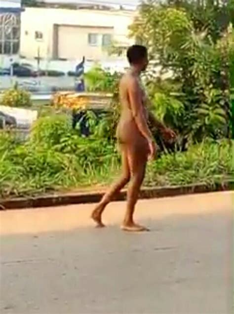 Lady Strips Unclad After Coming Down From A Car In Awka Photos