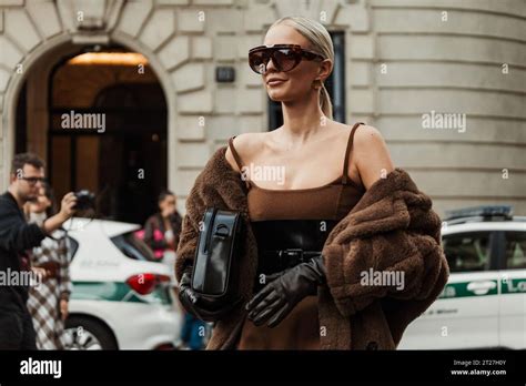 Leonie Hanne Wears Brown Dress Black Corset Gloves Teddy Coat Seen