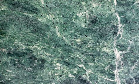 For a visually stunning and clean look, beautify your kitchen with green granite countertops ...