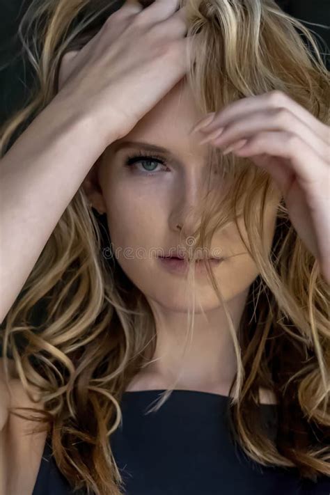 A Lovely Blonde Model Poses Outdoor While Enjoying The Spring Weather Stock Photo Image Of