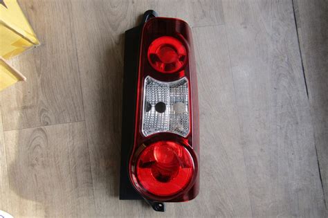 LAMPA TYLNA LEWA PEUGEOT PARTNER 2012 7034436255 Oficjalne