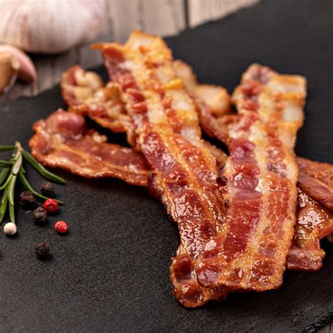 The Best Dry Cured Smoked Streaky Bacon Adding Its Intense Flavour To