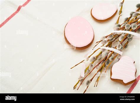 Easter Pussy Willows Branches Yellow Ribbon And Easter Gingerbread Hares Chickens And Eggs