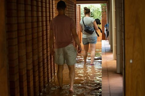 Residents Of Brisbanes Inner City Rosalie Area Rally To Survey Flood