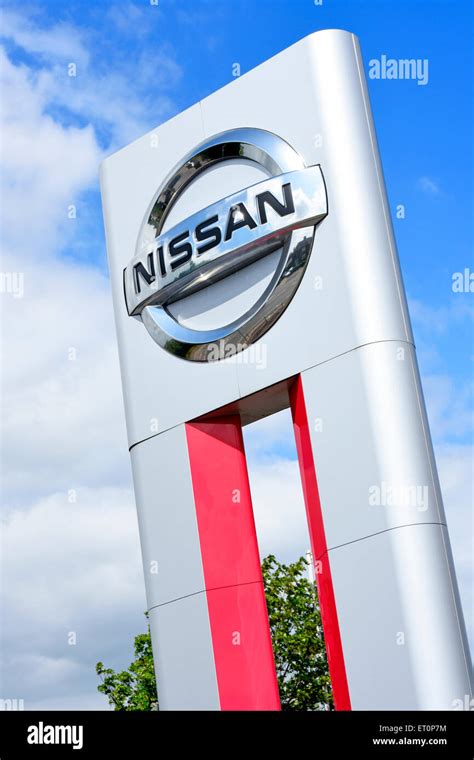 Nissan car dealer business logo sign and brand indicator outside new ...