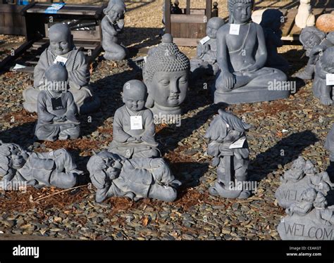 Buddha garden statues Stock Photo - Alamy