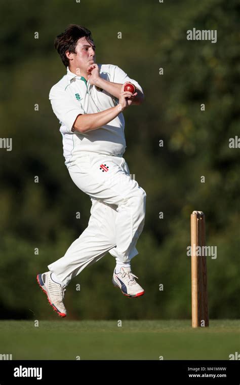 Cricket bowler delivering ball hi-res stock photography and images - Alamy